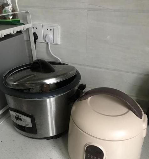 电饭煲按了没反应，可能的原因及解决方法（教你轻松排查电饭煲故障）  第1张