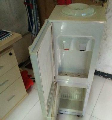 解决新饮水机味道问题的有效方法（如何快速去除新饮水机的异味）  第1张